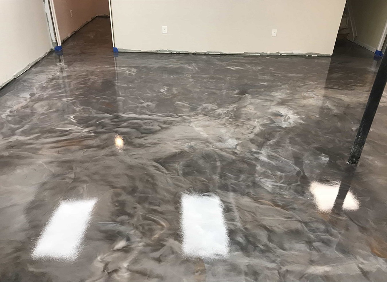 Metallic epoxy flooring solution